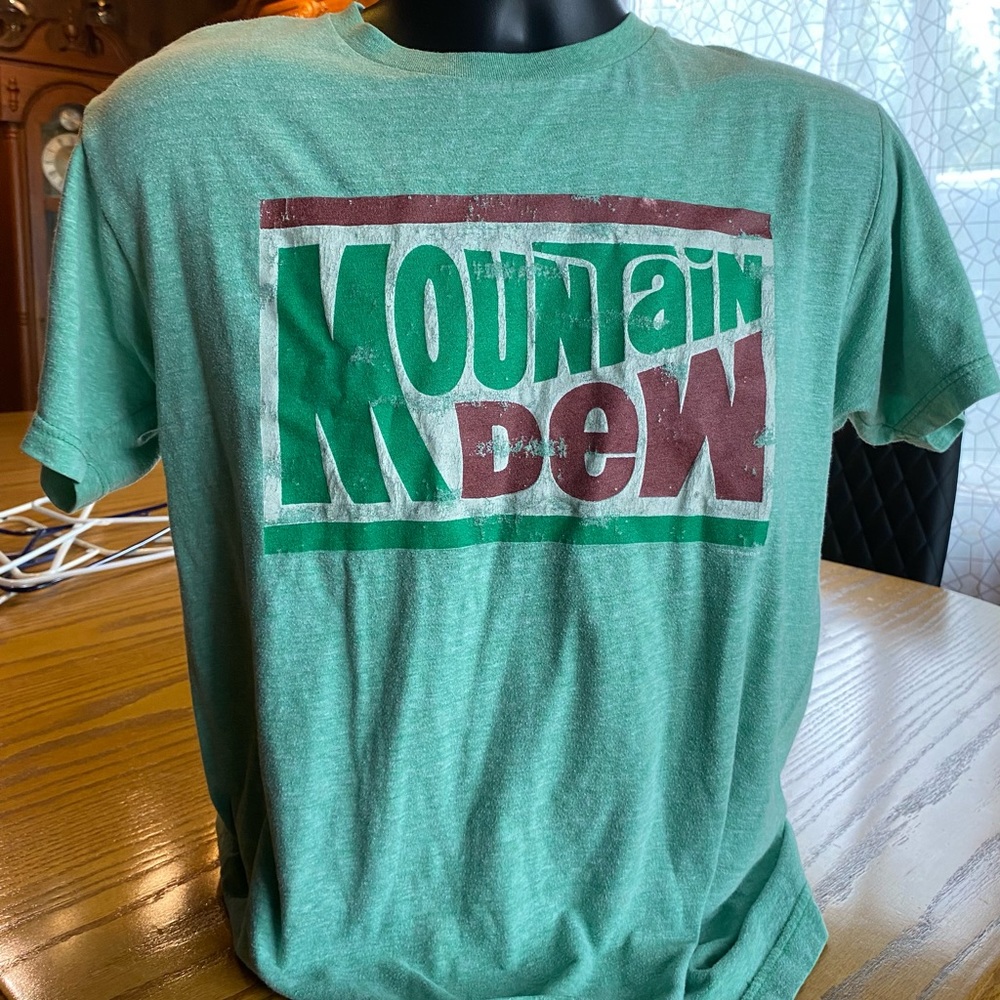 Vintage Mountain Dew promo short sleeve shirt distressed. Light green.